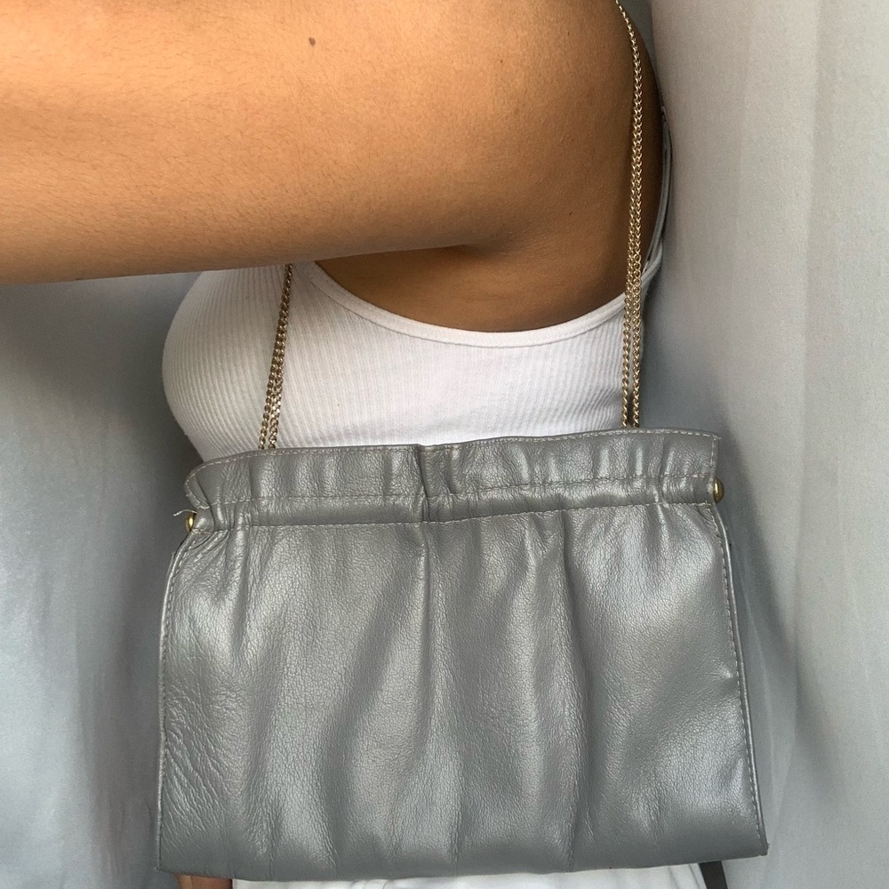 Grey patent leather purse with adjustable chain!